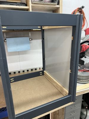 The same server rack as above sitting on a workbench